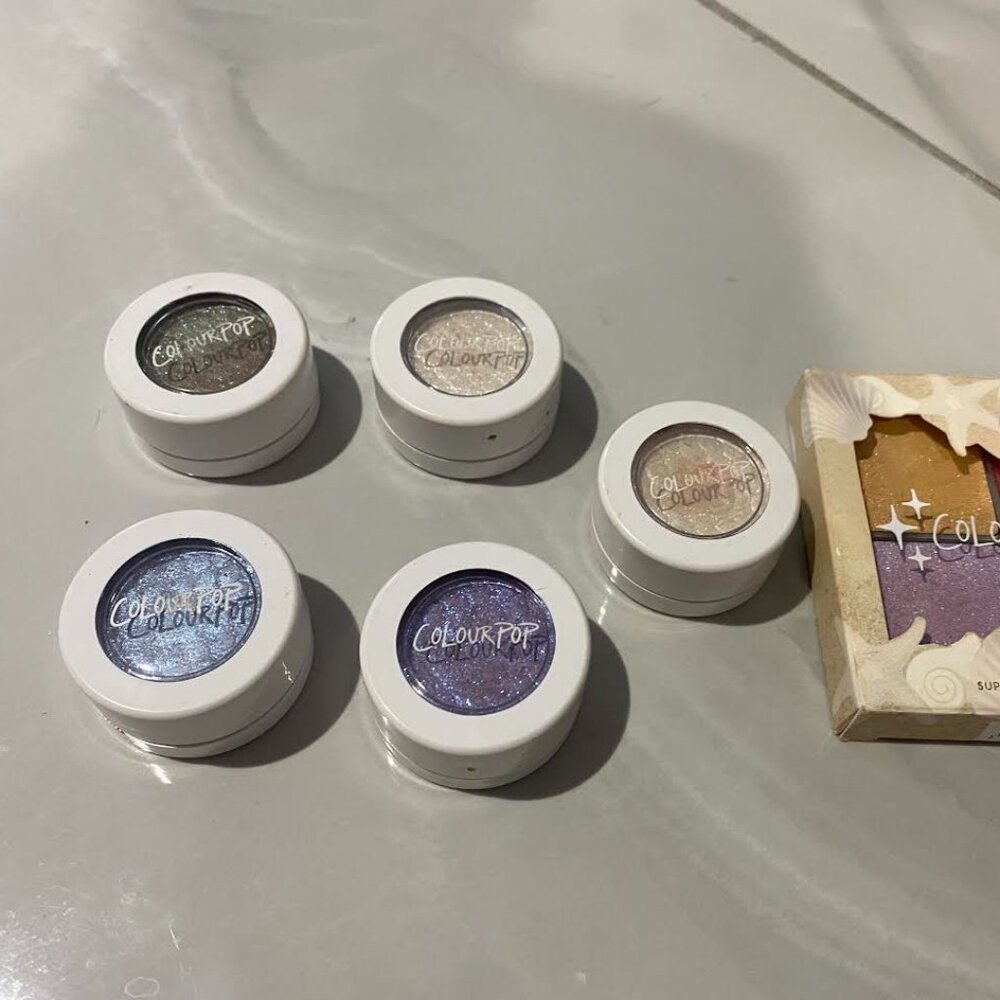 Colourpop super shock singles (new or gently used) and highlighter pallet (new)